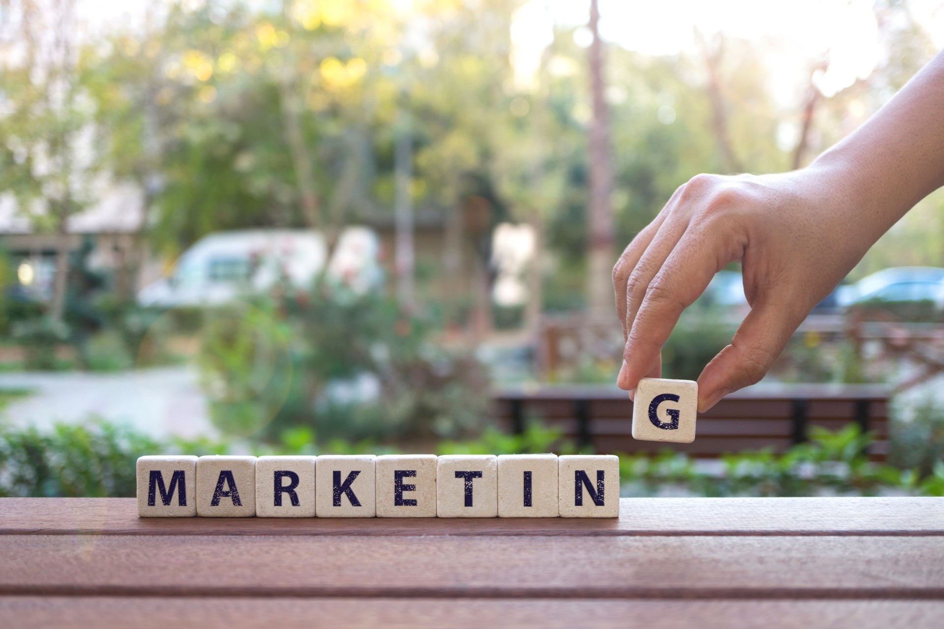 Marketing , Hand and Word with Alphabet Blocks